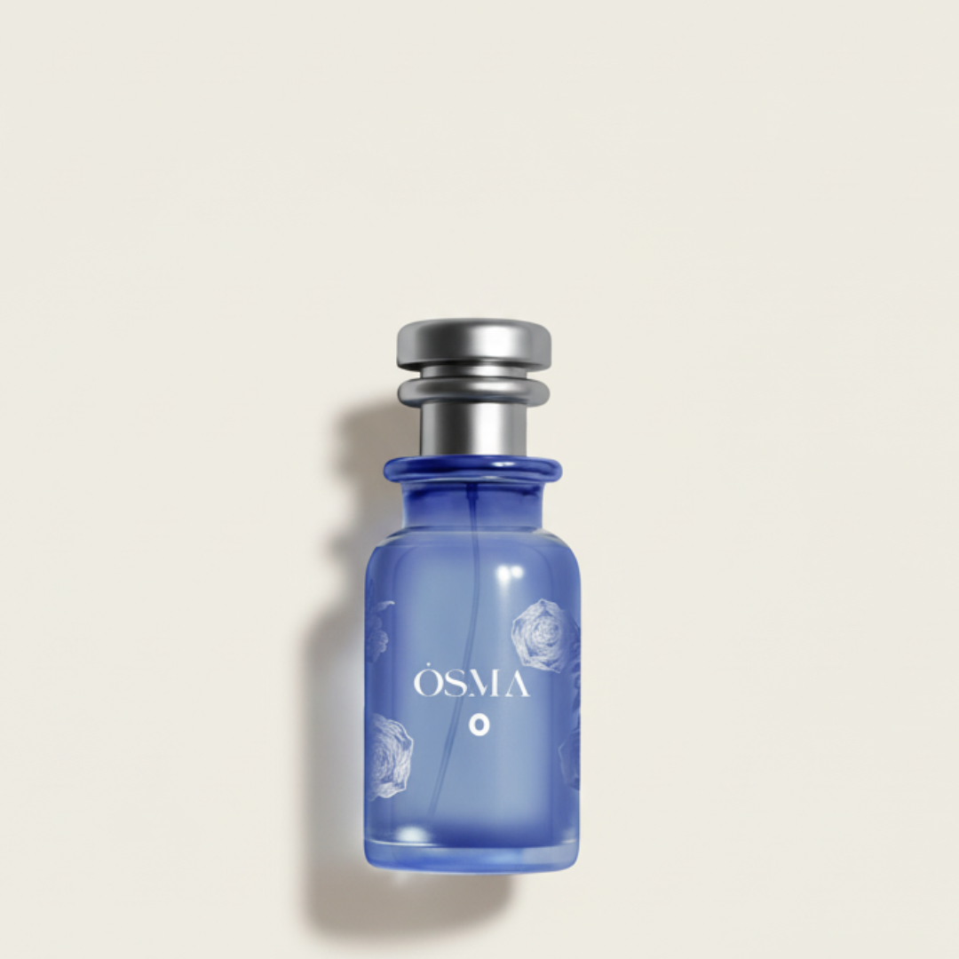 A sleek blue glass bottle labeled "Osma O 150ml EDP - Osma," with a metallic silver cap and white floral accents, suggests musky notes, displayed on a plain cream background.