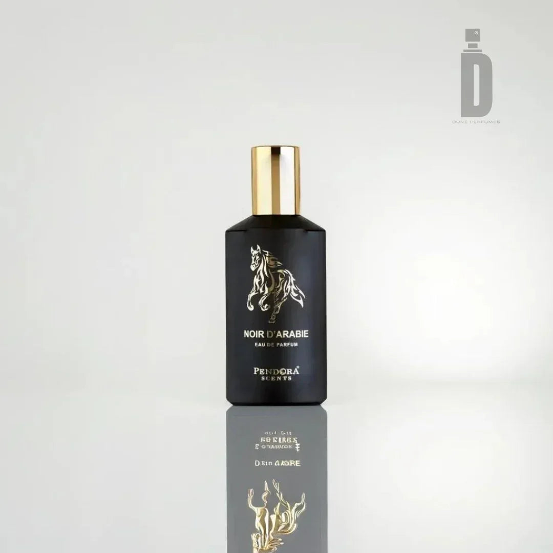 A sleek black bottle of Noir D'Arabie Pendora 100ml Eau de Parfum by Paris Corner. The bottle, featuring a golden cap and a golden horse design on its front, exudes an exotic fragrance with Arabian allure. The reflective surface beneath mirrors its image, set against a plain light-colored background.