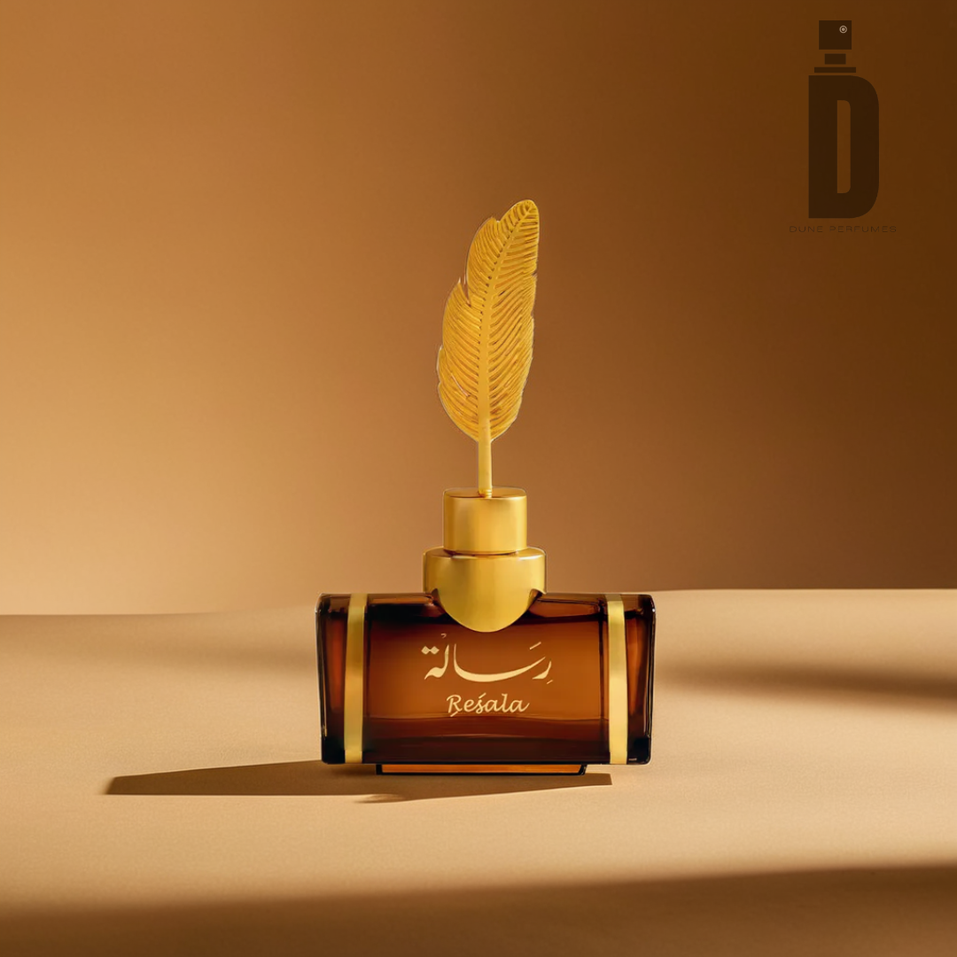 A luxurious perfume bottle infused with exotic spices and chocolate oud, featuring a golden feather cap, rests on a smooth, light brown surface. Shadows cast a soft gradient in the background, while the bottle is elegantly labeled "Resala 100ml EDP - Arabian Oud" from the brand Arabian Oud in graceful script.