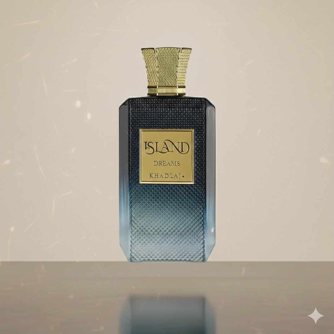 Island Dreams 100ml EDP by Khadlaj features a rectangular blue gradient bottle with a textured design, gold label, and gold cap. This perfume promises a tropical, refreshing scent and is showcased against a neutral background.