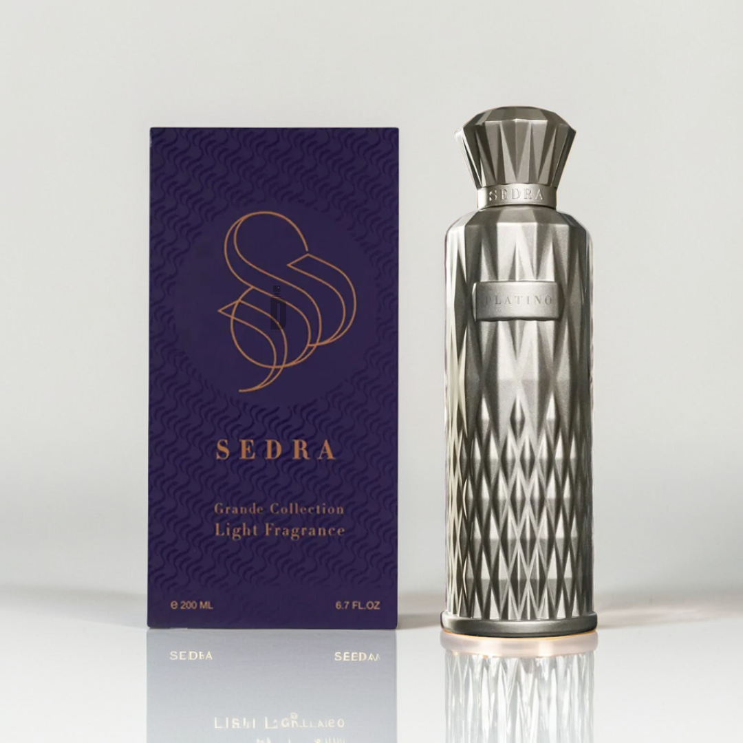 A metallic, textured bottle of Platino 200ml EDP by Sedra stands next to a dark purple box with gold lettering and an "S" logo. The box, labeled "Grande Collection Light Fragrance," suggests floral depth. Both are placed on a pristine white surface, exuding opulence.