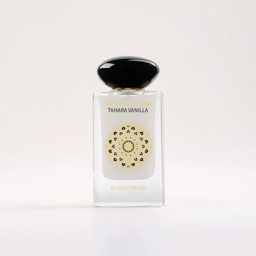 The "Musk Collection Tahara Vanilla 60ml EDP" from Gulf Orchid showcases a heart-adorned design on its front. This vanilla-scented gem features a black cap, elegantly highlighted against a plain white background.