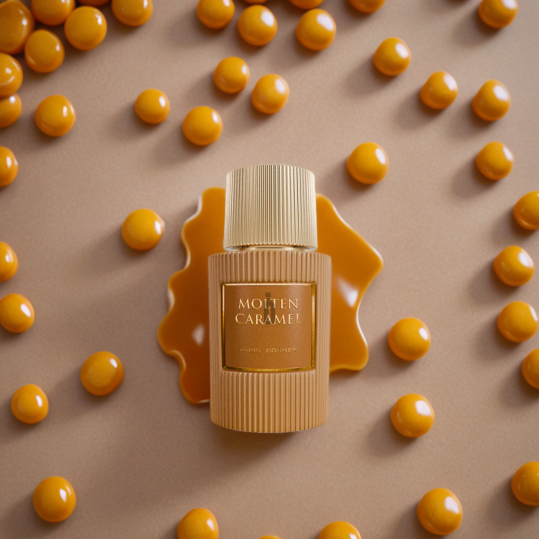 The 100ml "Molten Caramel" EDP by Paris Corner is set against a caramel-colored backdrop with glossy caramel spheres. Liquid caramel sprawls beneath, enhancing its exquisite design and evoking sweet indulgence.