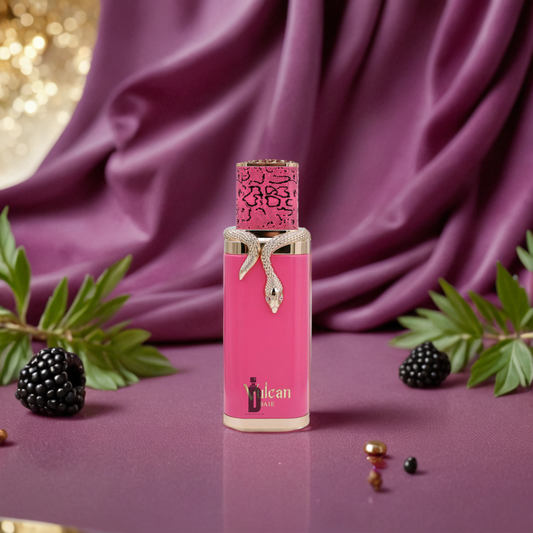 The Vulcan Baie 100ml EDP by Fragrance World stands on a purple surface with green leaves, blackberries, and gold beads, wrapped in a gold snake. Purple drapes and golden lights set a vibrant scene for this fruity French Avenue perfume.