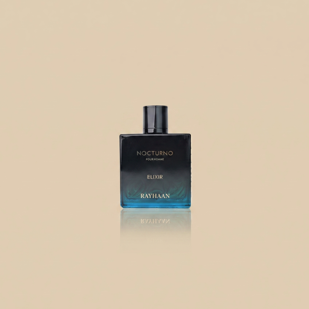 A rectangular black and blue bottle labeled "Nocturno Elixir 100ml EDP - Rayhaan" by Rayhaan stands upright on a plain beige background, reflecting the fresh aromatic essence of this fragrance.