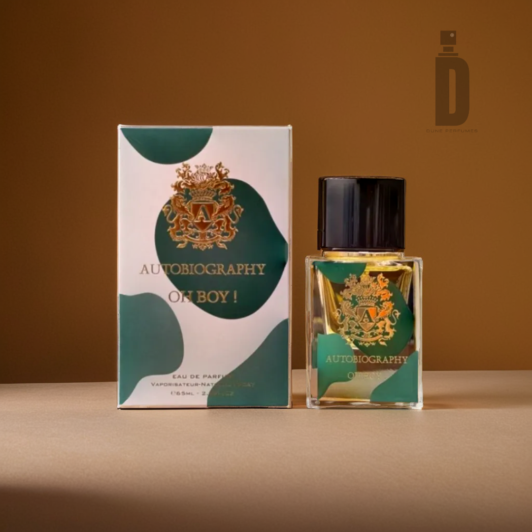 A bottle of Oh Boy! 65ml EDP from Paris Corner is elegantly displayed next to its coordinating box, both showcasing a harmonious green and white design adorned with a golden emblem. This enchanting fragrance by Paris Corner melds notes of citrus against a warm, gradient brown backdrop.