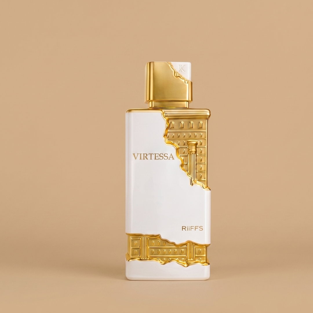Virtessa 100ml EDP by Riiffs features a white bottle with gold accents and intricate architectural designs, hinting at a floral scent blended with sandalwood, displayed against a beige background.