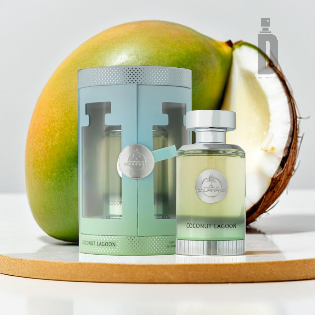 In a bright and minimalistic setting, a bottle of Coconut Lagoon 100ml EDP by Paris Corner, designed with a sleek glass finish, is showcased beside its coordinating decorative box. A halved coconut in the background subtly suggests the inspiration for the fragrance's scent.