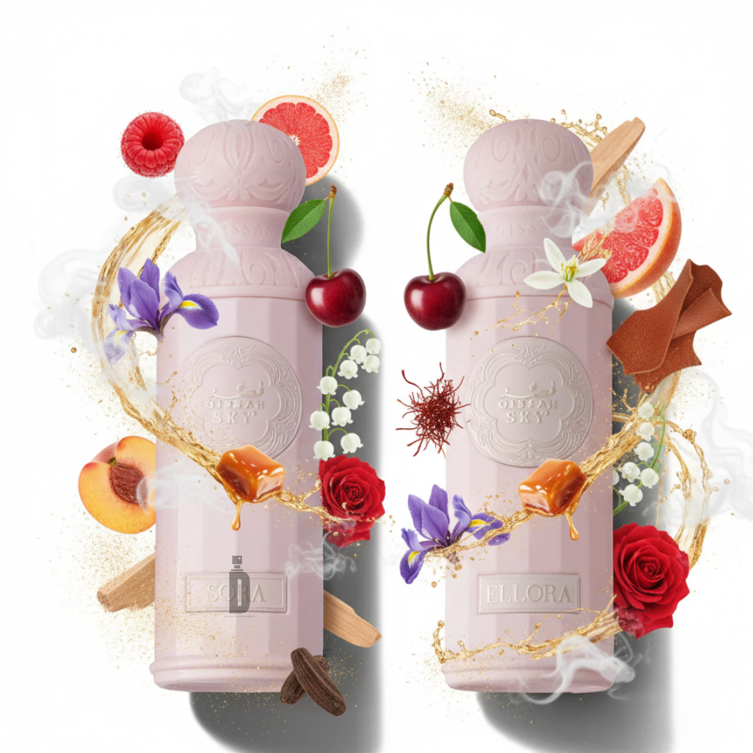 Two elegant pink bottles of Legend Of The Sky For Her Set by Gissah are surrounded by fruits, flowers, caramel cubes, saffron, rose, and spices with swirling golden liquid, capturing a luxurious feminine fragrance.