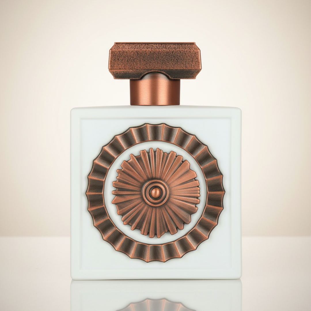 A white Nebras Elixir 100ml EDP by Lattafa features a bronze circular emblem and cap, showcased on a reflective surface against a neutral backdrop, capturing the essence of its alluring gourmand fragrance.