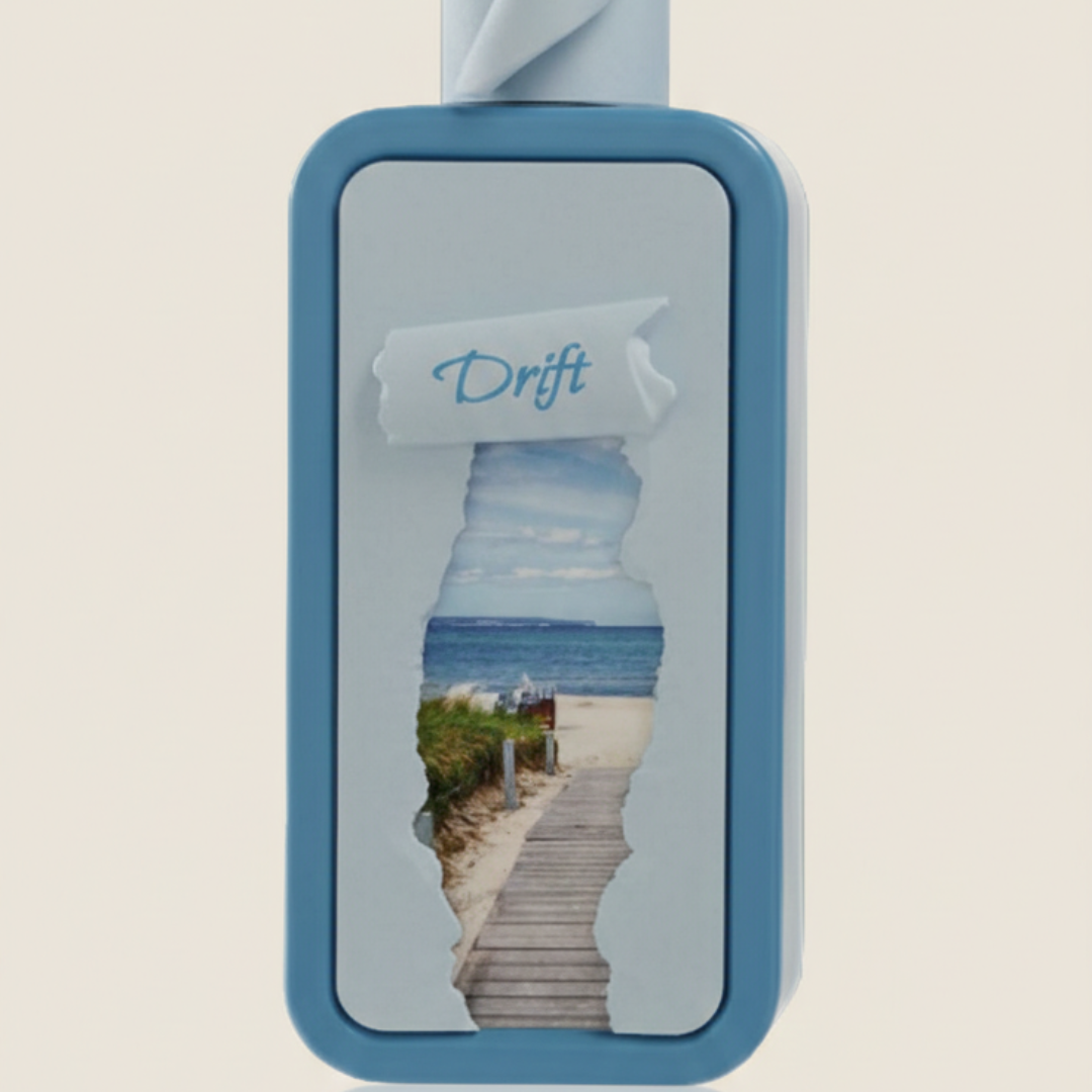 The Riiffs Seasons Drift 100ml EDP features a blue and white bottle with a beach boardwalk design under a blue sky and ocean, framed by torn paper—reflecting the fresh cedar and sandalwood scent.