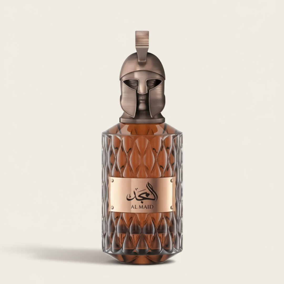 The Al Majd 100ml EDP by Le Falconé features a textured glass bottle with a metallic label in Arabic and a cap shaped like an ancient warrior helmet, holding an uplifting fragrance ideal for any occasion.