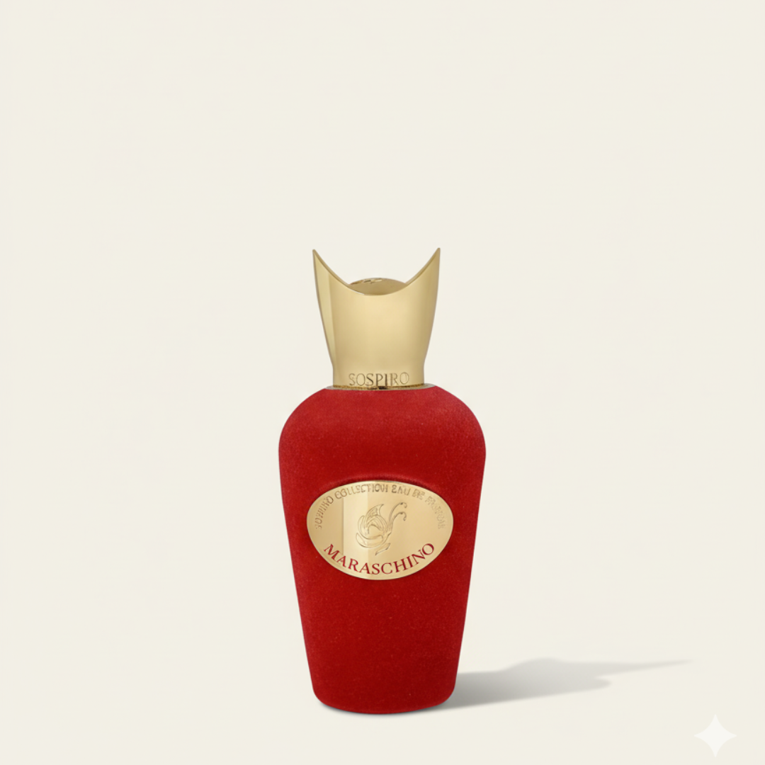 The Sospiro Maraschino 100ml EDP features a luxurious red bottle with a gold cap and label, displaying "Maraschino" and "Sospiro." This cherry fragrance stands out against a simple, light background.