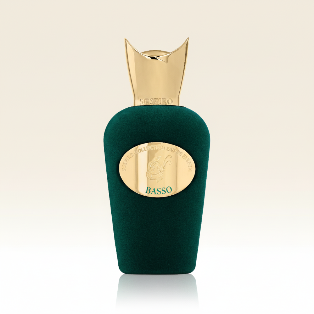A green perfume bottle with a gold, crown-shaped cap and gold oval label reading "Basso" stands against a light beige background, representing Sospiro's Basso 100ml EDP and evoking a bold, complex fragrance.