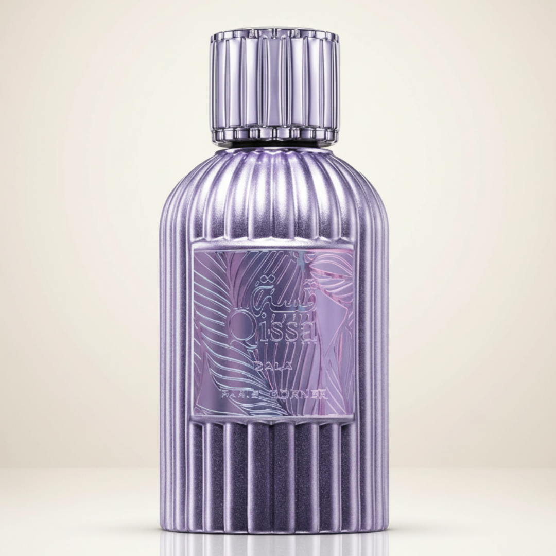 A metallic lavender Qissa Gala 100ml EDP bottle by Paris Corner features vertical ridges, a matching cap, and a decorative label with purple leaf patterns and silver text. The background is a soft cream gradient, evoking luxury.