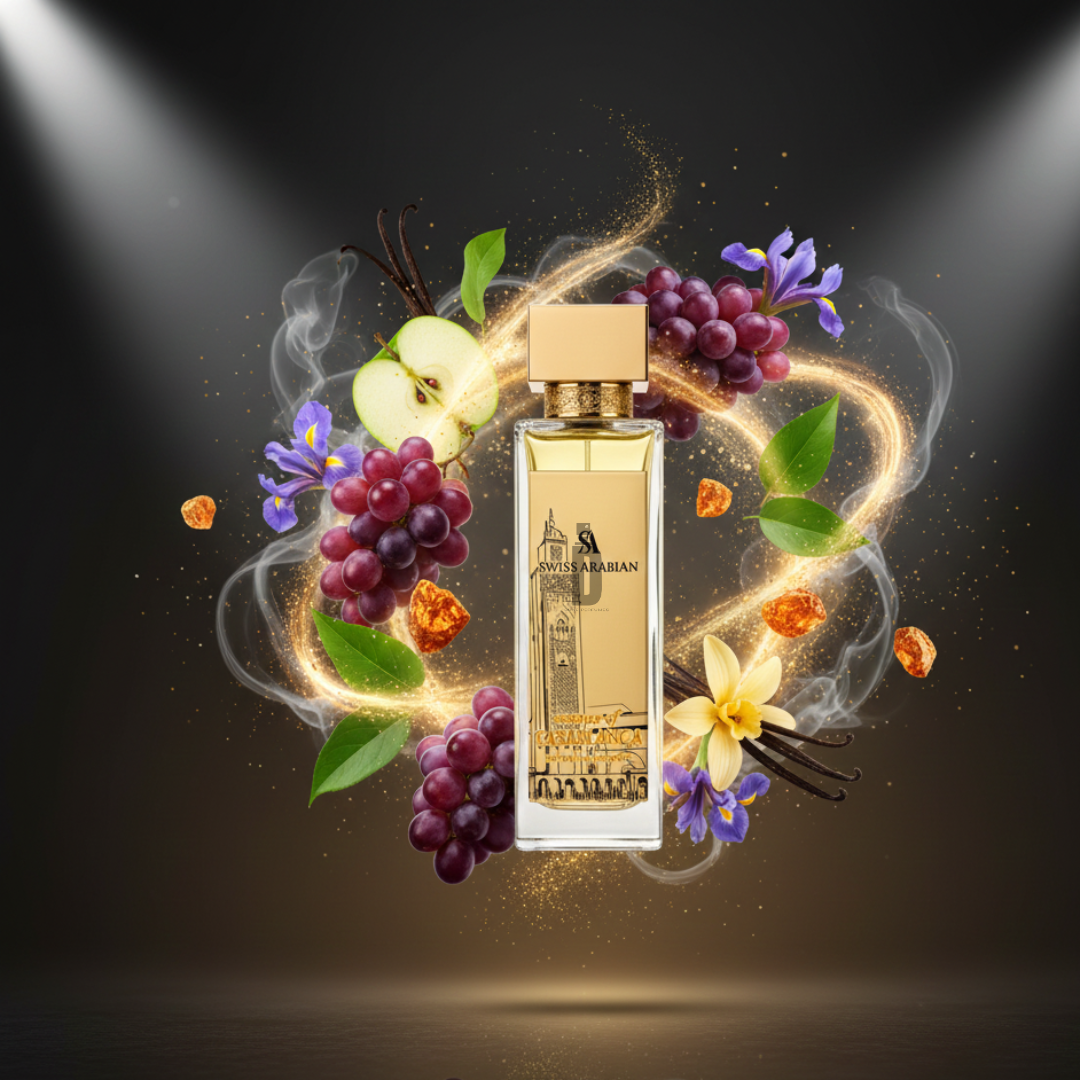 A glowing Essence Of Casablanca 100ml EDP by Swiss Arabian stands amid grapes, apple slices, amber, vanilla flowers, and green leaves—reflecting its elegant fragrance and luxurious presentation.