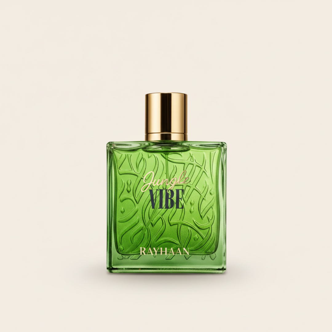 A square green bottle of Jungle Vibe 100ml EDP by Rayhaan, with a gold cap and embossed leafy glass, is set against a light background.