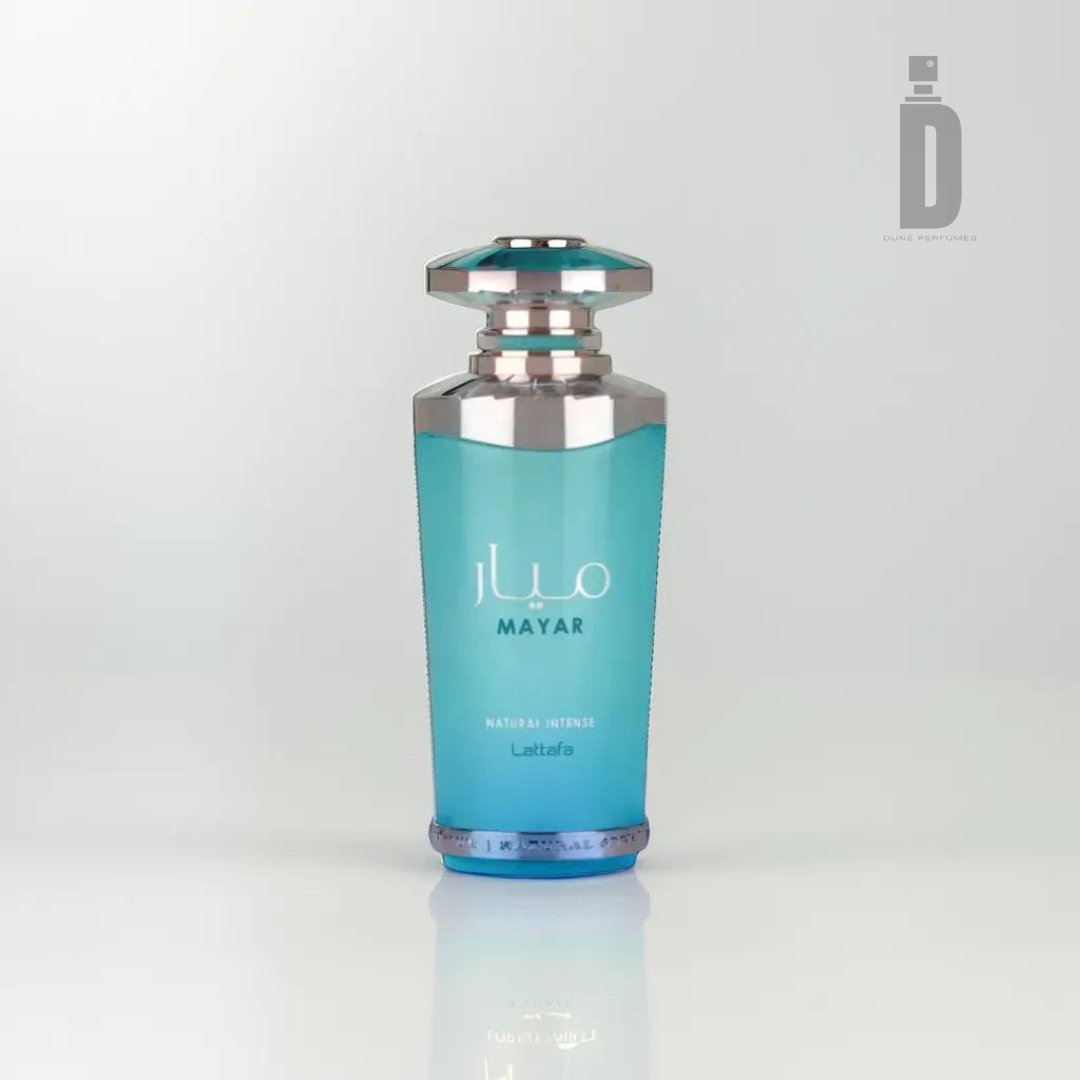 A perfume bottle in blue and silver featuring an octagonal cap. Adorned with Arabic script, the label highlights "Mayar Natural Intense" along with "NATURAL INTENSE" on the front, and prominently displays the manufacturer's name, "Lattafa." Set against a white background, the image captures a minimalist aesthetic that conveys the essence of nature's fragrance.