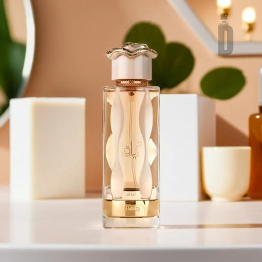 A 100ml bottle of Teriaq EDP by Lattafa, adorned with Arabic writing and showcasing a distinctive wavy design on the bottle along with an ornate cap. The enchanting fragrance is displayed on a white surface, surrounded by a plant and geometric decor elements in a softly lit ambiance.