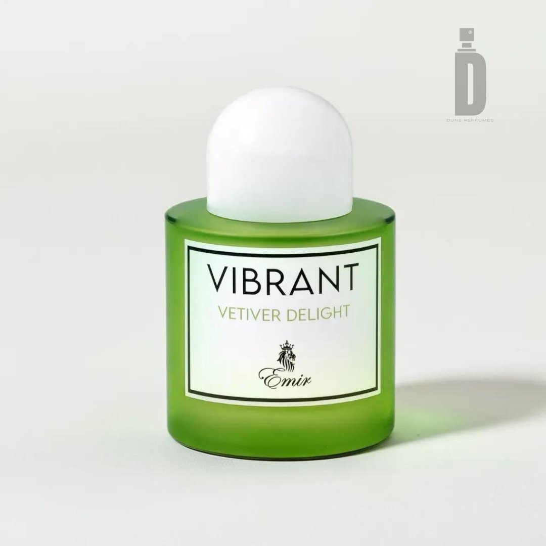A green bottle of perfume labeled "Vibrant Vetiver Delight 100ml EDP - Emir" by Paris Corner. The sophisticated scent features a rounded white cap and has a minimalist design. The background is plain and light-colored.
