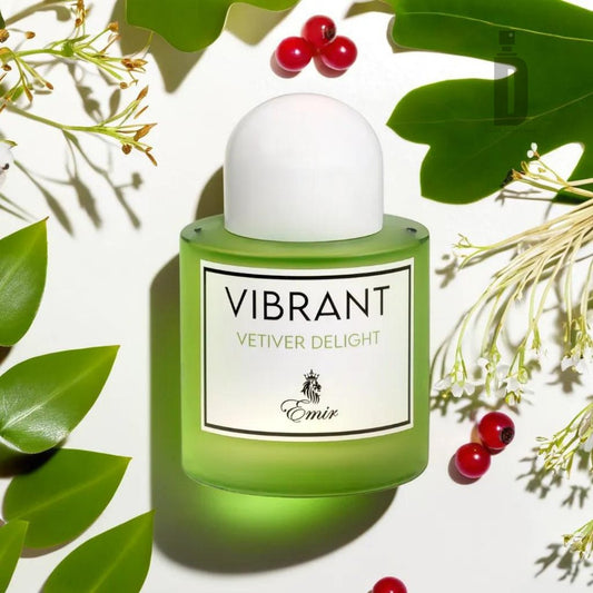 A bottle of "Vibrant Vetiver Delight 100ml EDP - Emir" by Paris Corner is centered against a light background. The bottle, featuring its green hue with a white cap and label, exudes a sophisticated scent. Surrounding it are green leaves, small white flowers, and red berries.